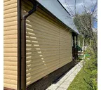 Виниловый сайдинг Docke Блок-Хаус D4.7T LUX под дерево Зрелый Каштан 3600×243