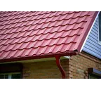 Металлочерепица Grand Line Kvinta Uno 0,45 Полиэстер RAL 3005 Красное вино